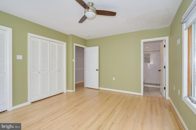 1104 Milroy Ct, Winchester, VA 22601 - unfurnished bedroom with light wood-style floors, ensuite bathroom, and ceiling fan