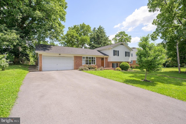 1104 Milroy Ct, Winchester, VA 22601 - split level home with asphalt driveway, brick siding, an attached garage, and a front lawn