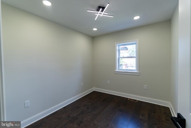 3815 Cottage Ave, Baltimore, MD 21215 - spare room with dark wood finished floors, baseboards, and recessed lighting