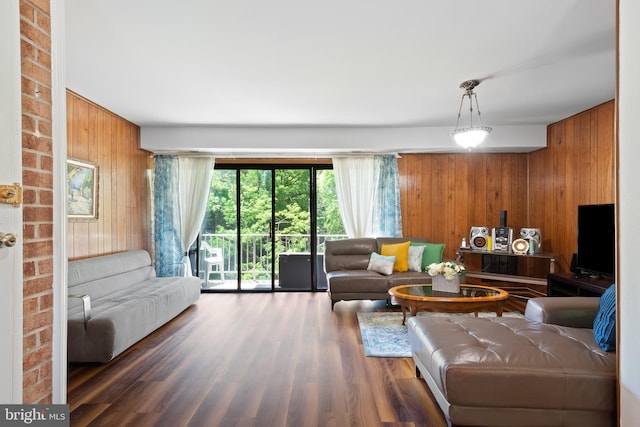 6034 Westchester Park Dr Unit 202, College Park, MD 20740 - living area featuring wooden walls and wood finished floors