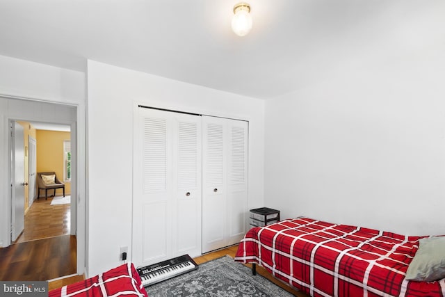 6034 Westchester Park Dr Unit 202, College Park, MD 20740 - bedroom with wood finished floors and a closet
