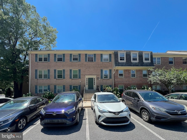 6034 Westchester Park Dr Unit 202, College Park, MD 20740 - view of property featuring uncovered parking