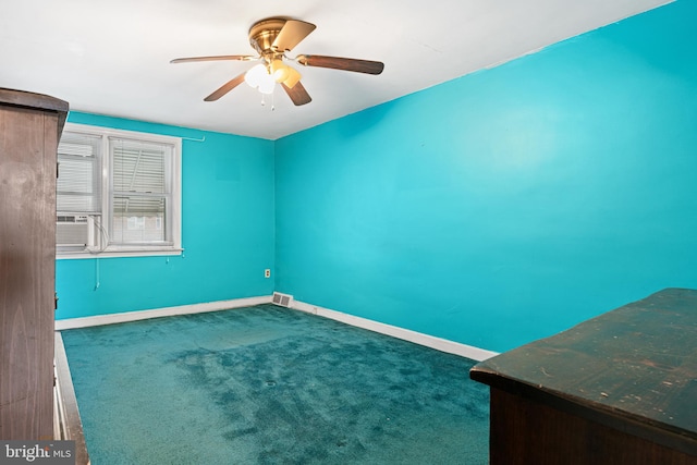 7164 Walker St, Philadelphia, PA 19135 - spare room with baseboards, carpet flooring, and a ceiling fan