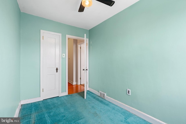 7164 Walker St, Philadelphia, PA 19135 - unfurnished bedroom with carpet floors, baseboards, and ceiling fan