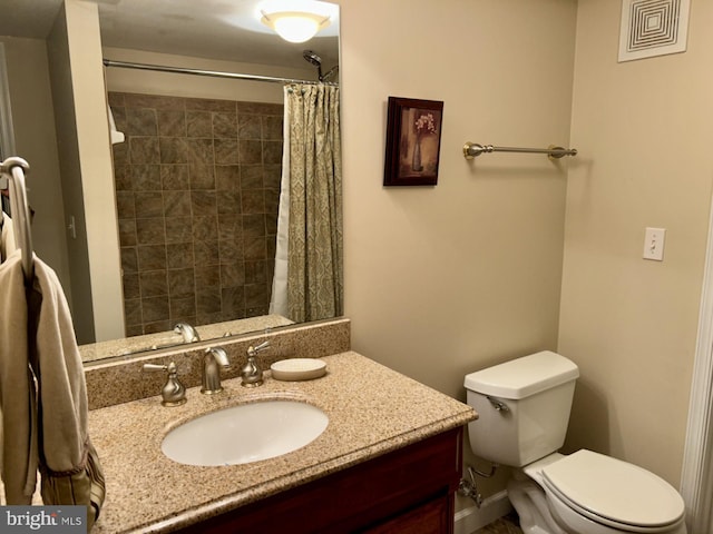 569 Highbank Rd, Severna Park, MD 21146 - bathroom featuring vanity, toilet, and tiled shower