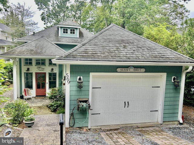 569 Highbank Rd, Severna Park, MD 21146 - view of front of home with a shingled roof and a garage