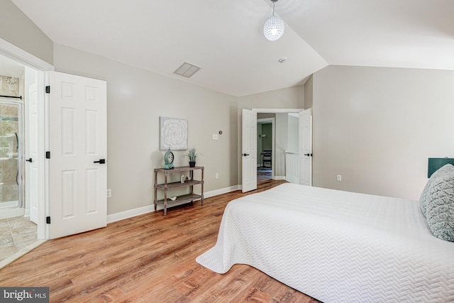 857 Barcelona St, Townsend, DE 19734 - bedroom with light wood-style flooring, lofted ceiling, and baseboards