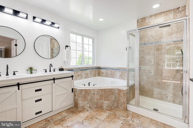 857 Barcelona St, Townsend, DE 19734 - full bathroom with a bath, double vanity, a shower stall, and recessed lighting
