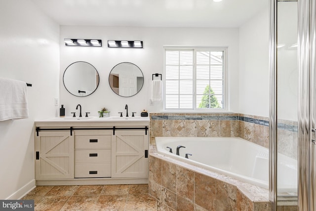 857 Barcelona St, Townsend, DE 19734 - full bathroom featuring double vanity and a garden tub