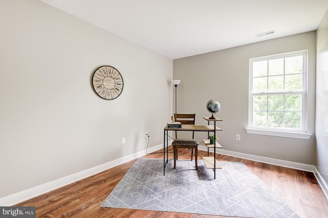 857 Barcelona St, Townsend, DE 19734 - home office featuring baseboards and wood finished floors