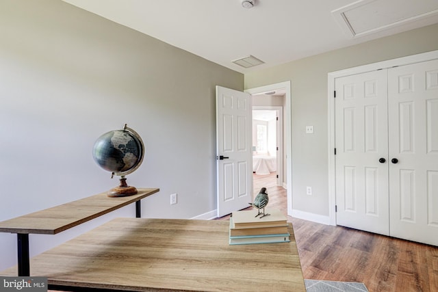 857 Barcelona St, Townsend, DE 19734 - office space with wood finished floors, baseboards, and attic access