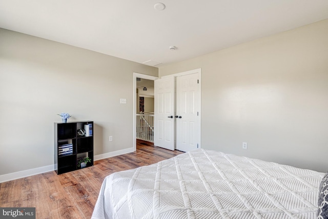 857 Barcelona St, Townsend, DE 19734 - bedroom featuring wood finished floors, baseboards, and a closet