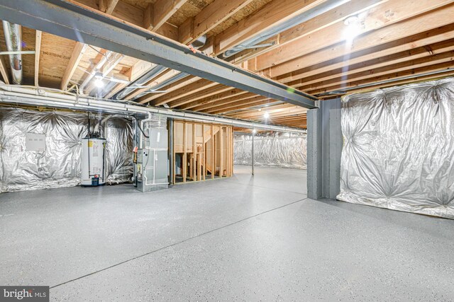 857 Barcelona St, Townsend, DE 19734 - unfinished basement with water heater and heating unit