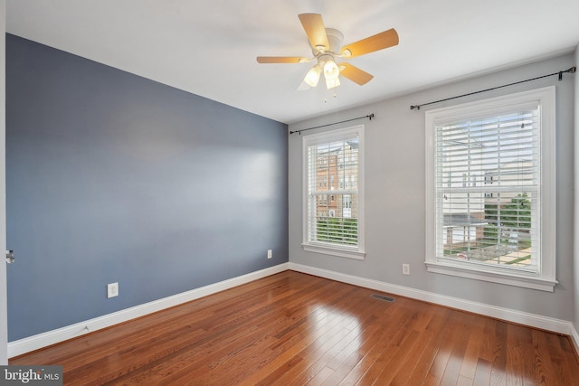 20677 Erskine Ter, Ashburn, VA 20147 - unfurnished room with hardwood / wood-style flooring, baseboards, and ceiling fan