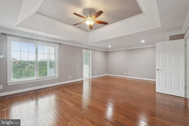 20677 Erskine Ter, Ashburn, VA 20147 - unfurnished room featuring a tray ceiling, a ceiling fan, hardwood / wood-style floors, baseboards, and crown molding