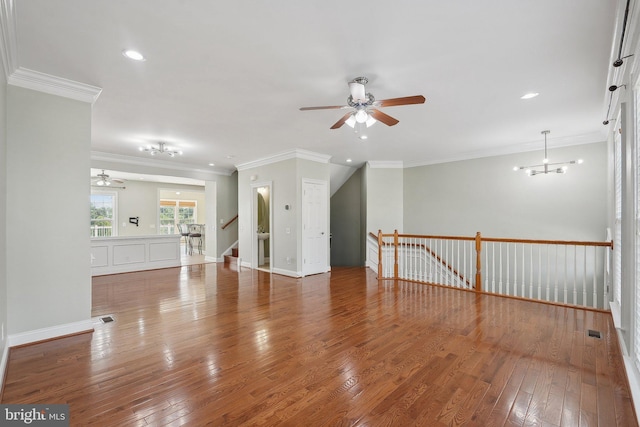 20677 Erskine Ter, Ashburn, VA 20147 - empty room featuring a ceiling fan, hardwood / wood-style flooring, recessed lighting, crown molding, and baseboards