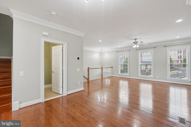 20677 Erskine Ter, Ashburn, VA 20147 - unfurnished living room featuring a ceiling fan, wood-type flooring, ornamental molding, baseboards, and recessed lighting