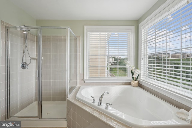 20677 Erskine Ter, Ashburn, VA 20147 - full bathroom with a garden tub and a shower stall