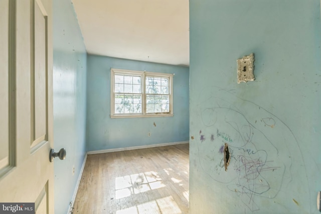 116 Layton Dr, New Castle, DE 19720 - unfurnished bedroom featuring hardwood / wood-style floors and baseboards