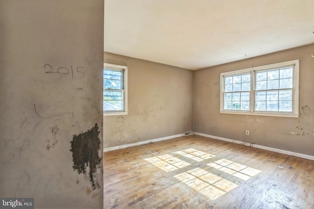 116 Layton Dr, New Castle, DE 19720 - empty room featuring hardwood / wood-style flooring and baseboards
