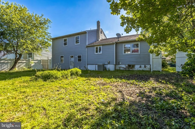 116 Layton Dr, New Castle, DE 19720 - rear view of property featuring a chimney