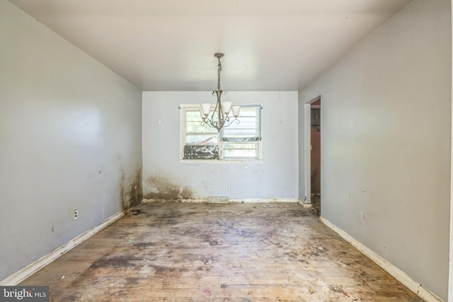 116 Layton Dr, New Castle, DE 19720 - unfurnished dining area with a chandelier, wood finished floors, and baseboards