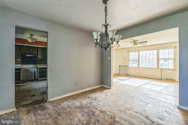 116 Layton Dr, New Castle, DE 19720 - unfurnished dining area featuring a chandelier, baseboards, and wood finished floors