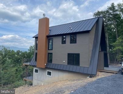 LOT316 Sycamore Rd, Mount Jackson, VA 22842 - view of side of home with a chimney, a standing seam roof, and metal roof