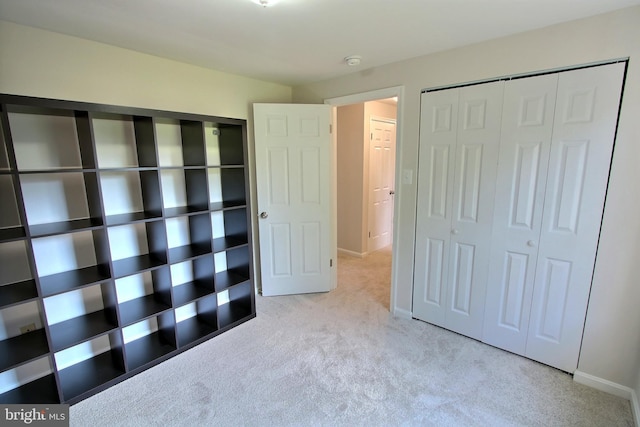 813 Pointer Ridge Dr, Gaithersburg, MD 20878 - unfurnished bedroom with carpet flooring, a closet, and baseboards