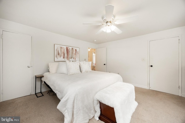 200 Maplewood Dr Unit 20, Pottstown, PA 19464 - bedroom with light carpet and a ceiling fan