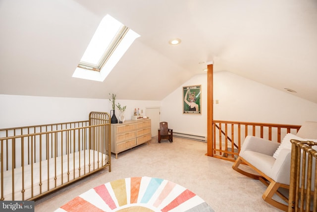 200 Maplewood Dr Unit 20, Pottstown, PA 19464 - carpeted bedroom featuring a baseboard radiator, a skylight, and lofted ceiling