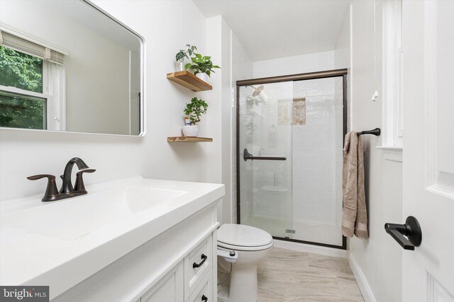 8 Crestwood Dr, Hamilton, NJ 08690 - full bathroom with a stall shower, toilet, vanity, and baseboards