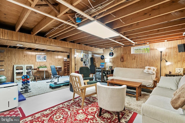 8 Crestwood Dr, Hamilton, NJ 08690 - living room featuring wooden walls and finished concrete floors