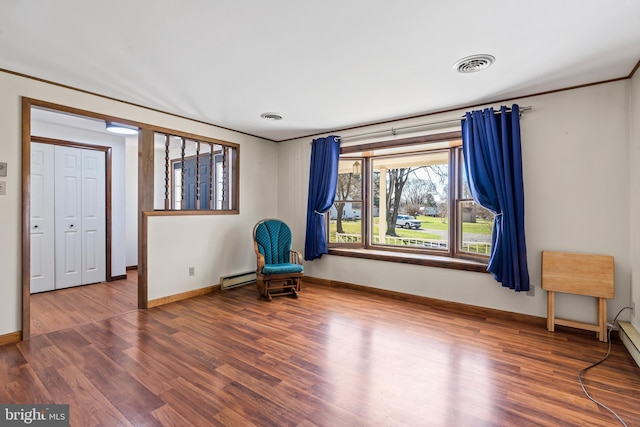 18000 Davis Ln, Boonsboro, MD 21713 - unfurnished room featuring a baseboard radiator, baseboards, wood finished floors, and ornamental molding