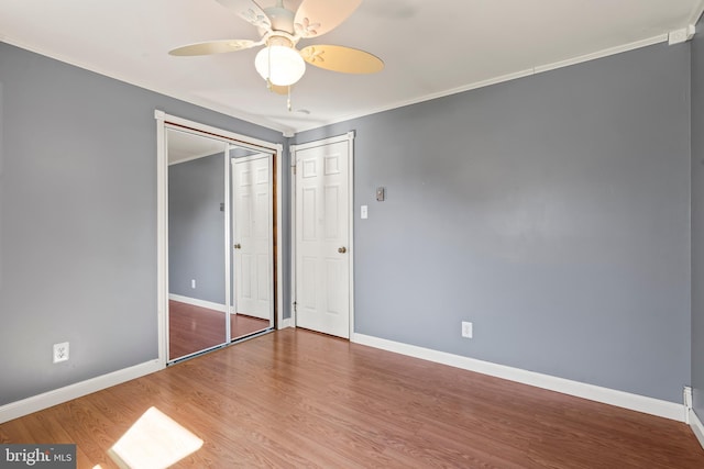 18000 Davis Ln, Boonsboro, MD 21713 - unfurnished bedroom with baseboards, wood finished floors, ornamental molding, and a ceiling fan