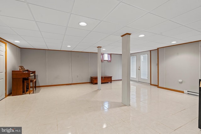 18000 Davis Ln, Boonsboro, MD 21713 - basement with a baseboard radiator, a drop ceiling, tile patterned floors, baseboards, and recessed lighting