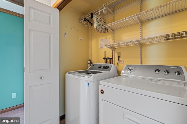 18000 Davis Ln, Boonsboro, MD 21713 - laundry room featuring independent washer and dryer and wood finished floors