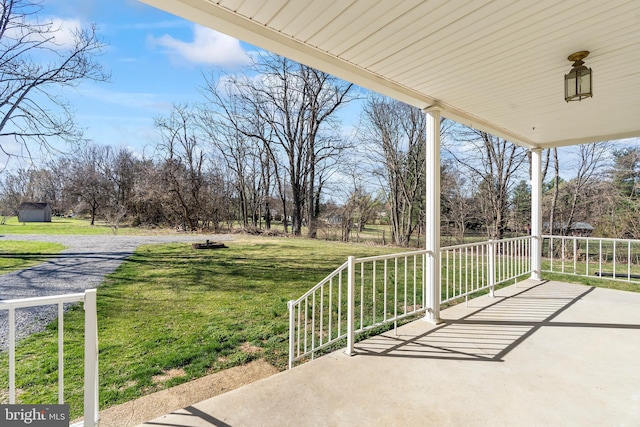 18000 Davis Ln, Boonsboro, MD 21713 - covered porch with a lawn and view of wooded area