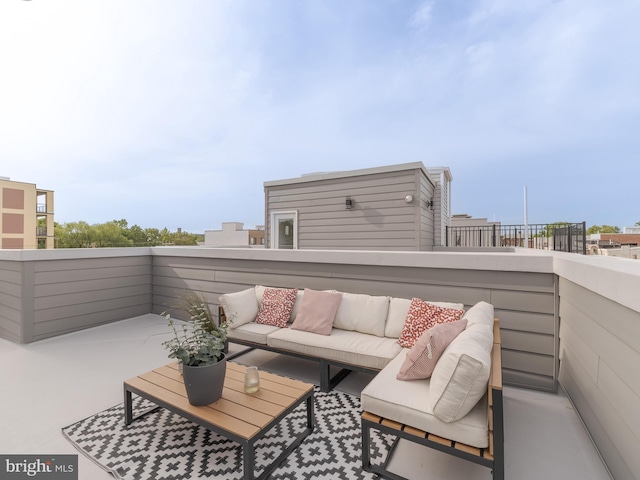 view of patio / terrace with an outdoor living space and a balcony
