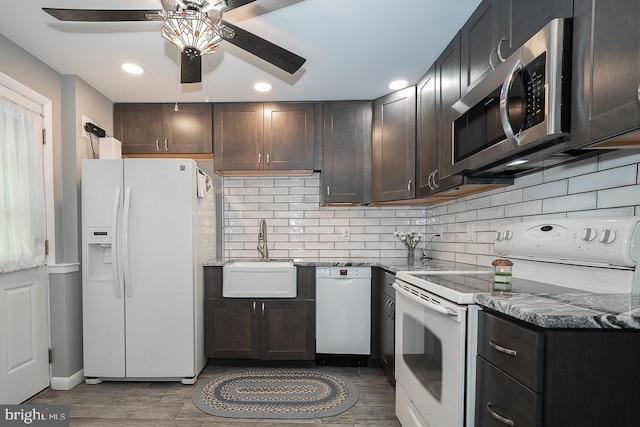 5330 Birney Hwy, Aston, PA 19014 - kitchen featuring white appliances, a sink, a ceiling fan, dark brown cabinets, and backsplash