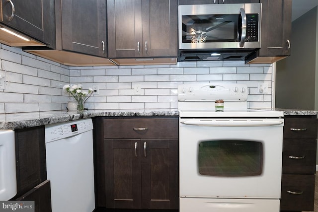5330 Birney Hwy, Aston, PA 19014 - kitchen with white appliances, dark brown cabinetry, and tasteful backsplash