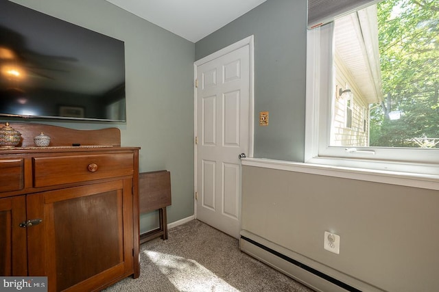 5330 Birney Hwy, Aston, PA 19014 - bedroom featuring a baseboard radiator, light colored carpet, and baseboards