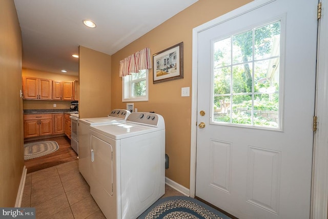 5330 Birney Hwy, Aston, PA 19014 - laundry room featuring washer and dryer, healthy amount of natural light, recessed lighting, baseboards, and light tile patterned floors
