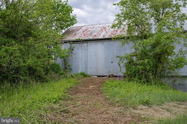 5143 S Middle Rd, Mount Jackson, VA 22842 - view of side of home featuring an outbuilding and metal roof