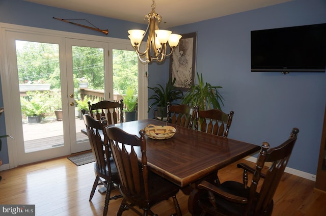 1331 Bradley Ave, Hummelstown, PA 17036 - dining area featuring a chandelier, light wood-type flooring, and french doors