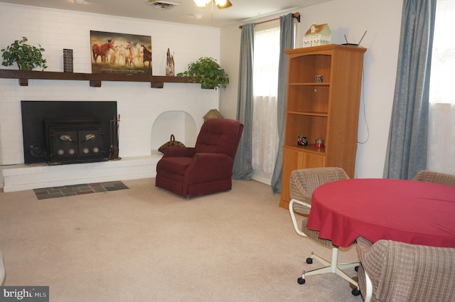 1331 Bradley Ave, Hummelstown, PA 17036 - carpeted living area with a brick fireplace