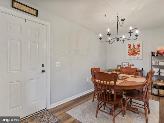 108 Timberlake Ter Unit 7, Stephens City, VA 22655 - dining room with a chandelier, wood finished floors, and baseboards