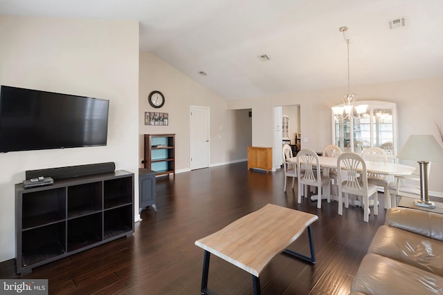 53 Stockport Dr, Toms River, NJ 08757 - living room with a chandelier, dark wood finished floors, high vaulted ceiling, and baseboards
