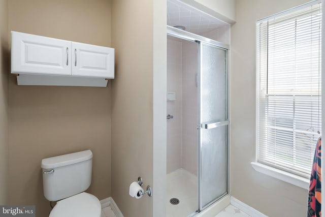 53 Stockport Dr, Toms River, NJ 08757 - bathroom with a stall shower, toilet, and baseboards