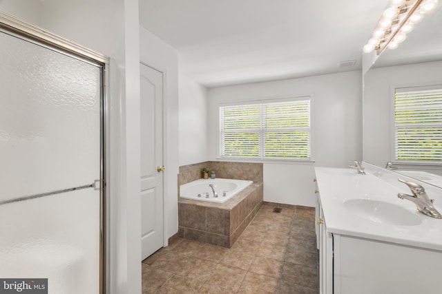 56 Thackery Ct, Sewell, NJ 08080 - bathroom featuring a garden tub, plenty of natural light, a shower stall, and double vanity